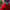 Man on jobsite in limited edition red tee and navy blue snapback