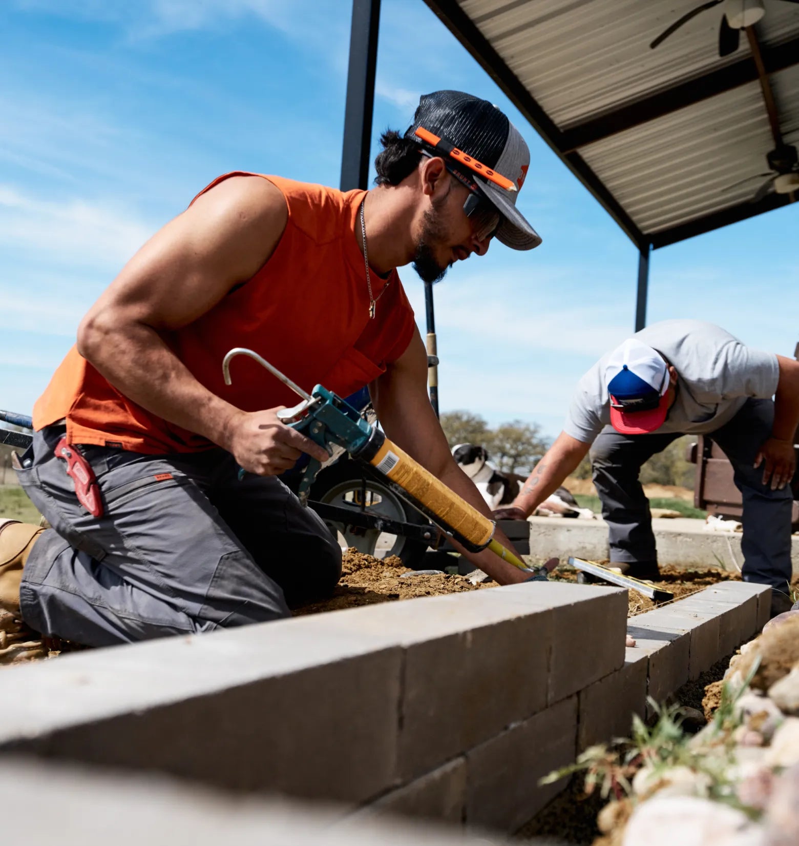 Man wearing BRUNT comfortable sleeveless pocket tee