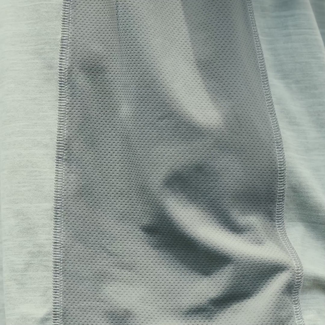 Video of man on jobsite wearing BRUNT lightweight quarter zip sun shirt with UPF protection in grey heather on jobsite