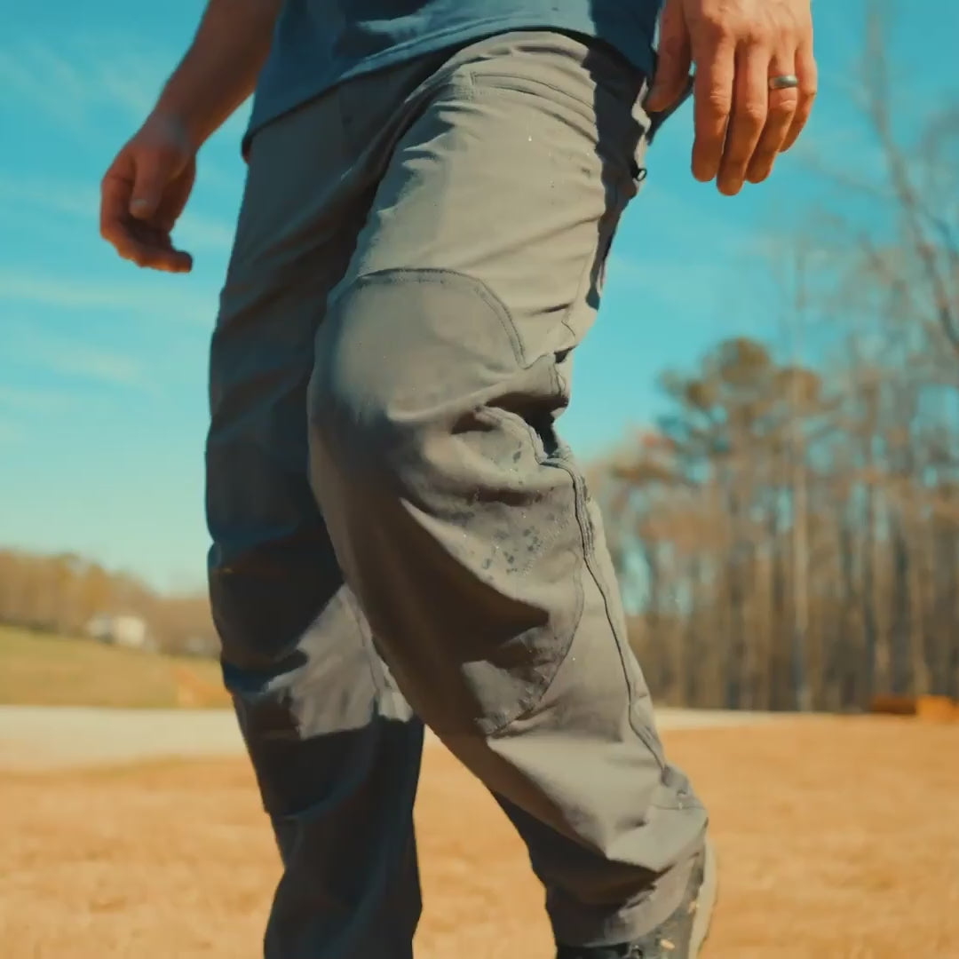 Video of man on jobsite wearing BRUNT water resistant durable breathable work pant in charcoal