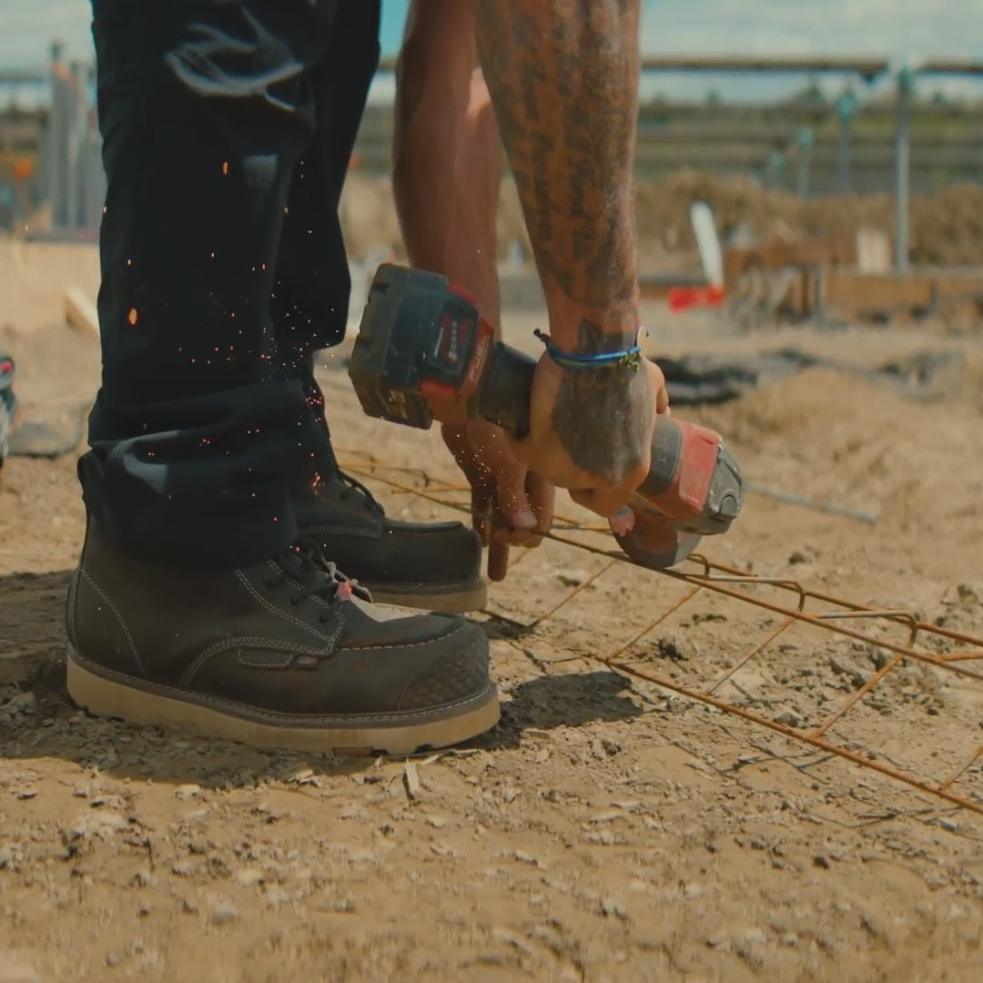 video of BRUNT USA 6 inch welted waterproof reinforced composite toe work boot in dark brown on the jobsite