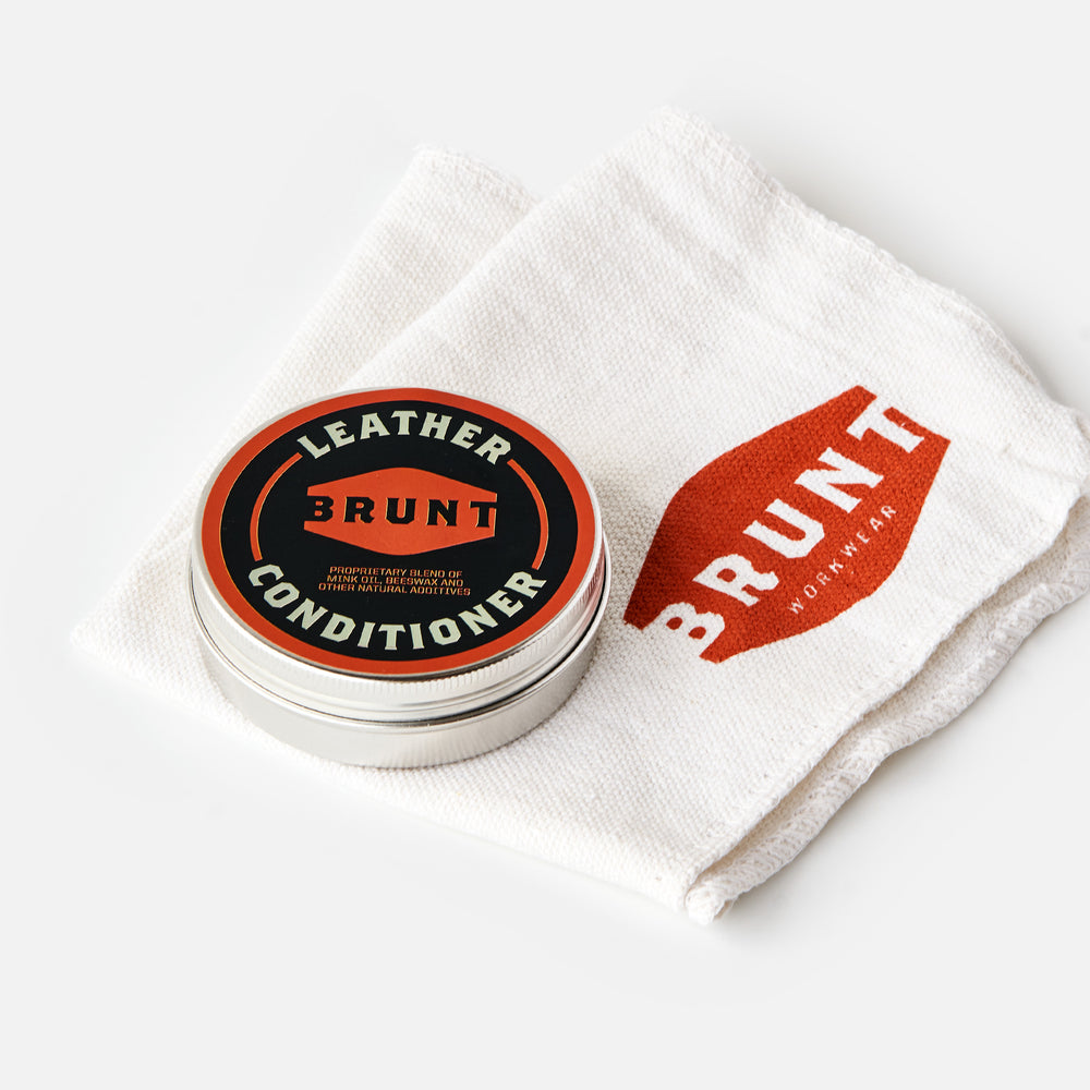Container of BRUNT Leather Work Boot Conditioner and Shop Rag with BRUNT Logo